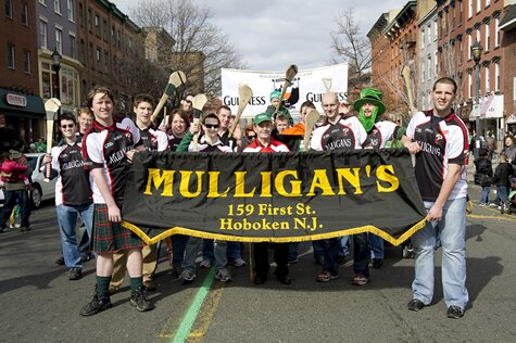 Guards on the March at the 2011 Hoboken St. Patrick's Day Parade, holding both Club and Sponsor banners